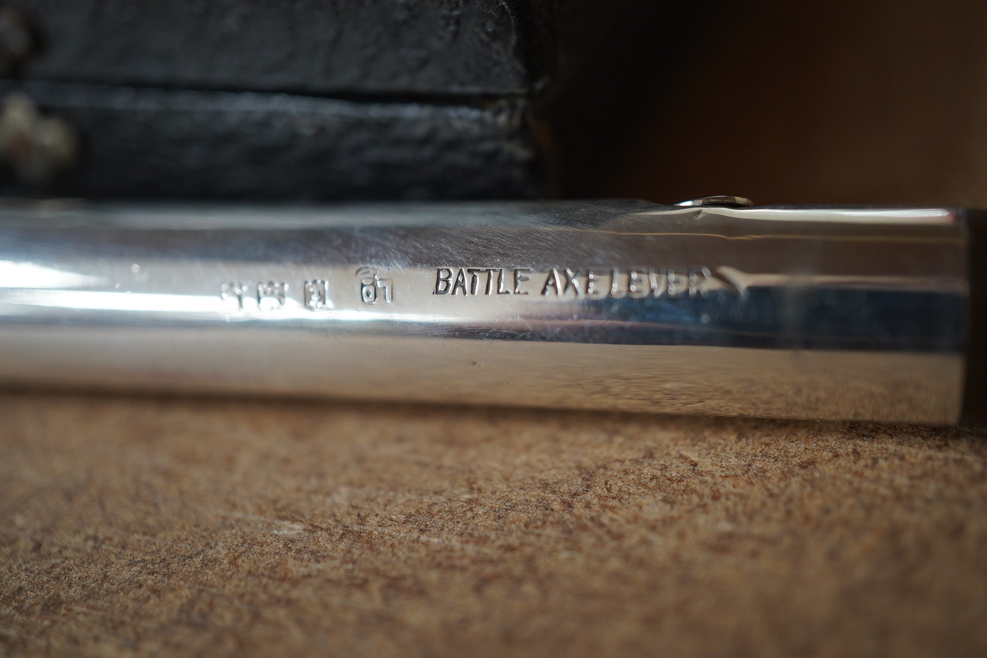 A Battle Axe lever fountain pen in silver, with 14ct gold nib, 14cm in length. Condition - fair